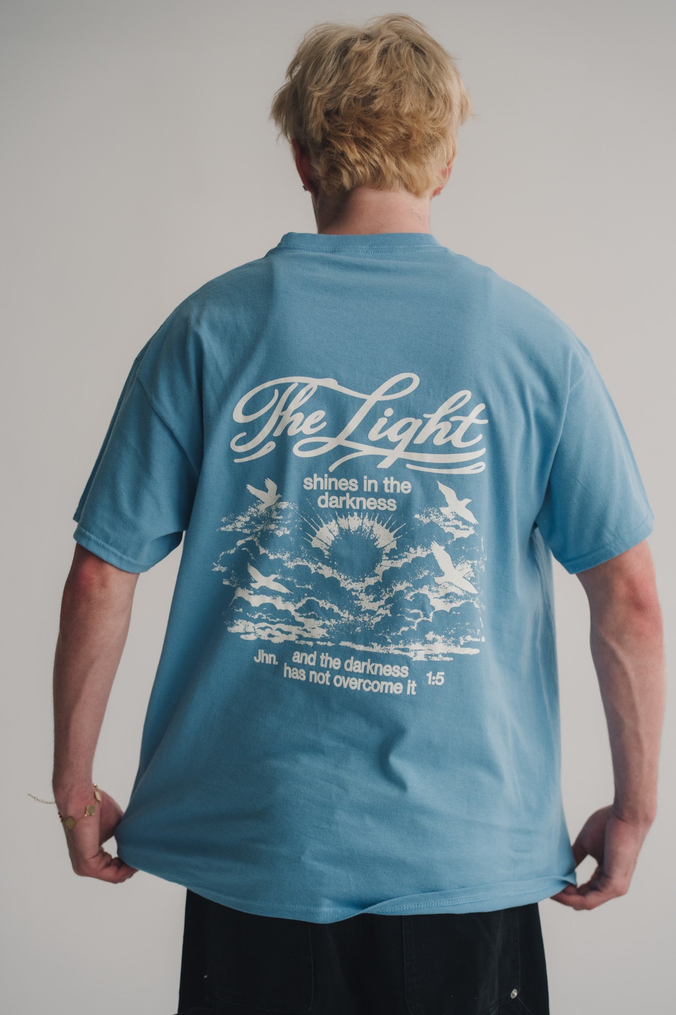 "The Light Shines" Tee Jesus Loves You